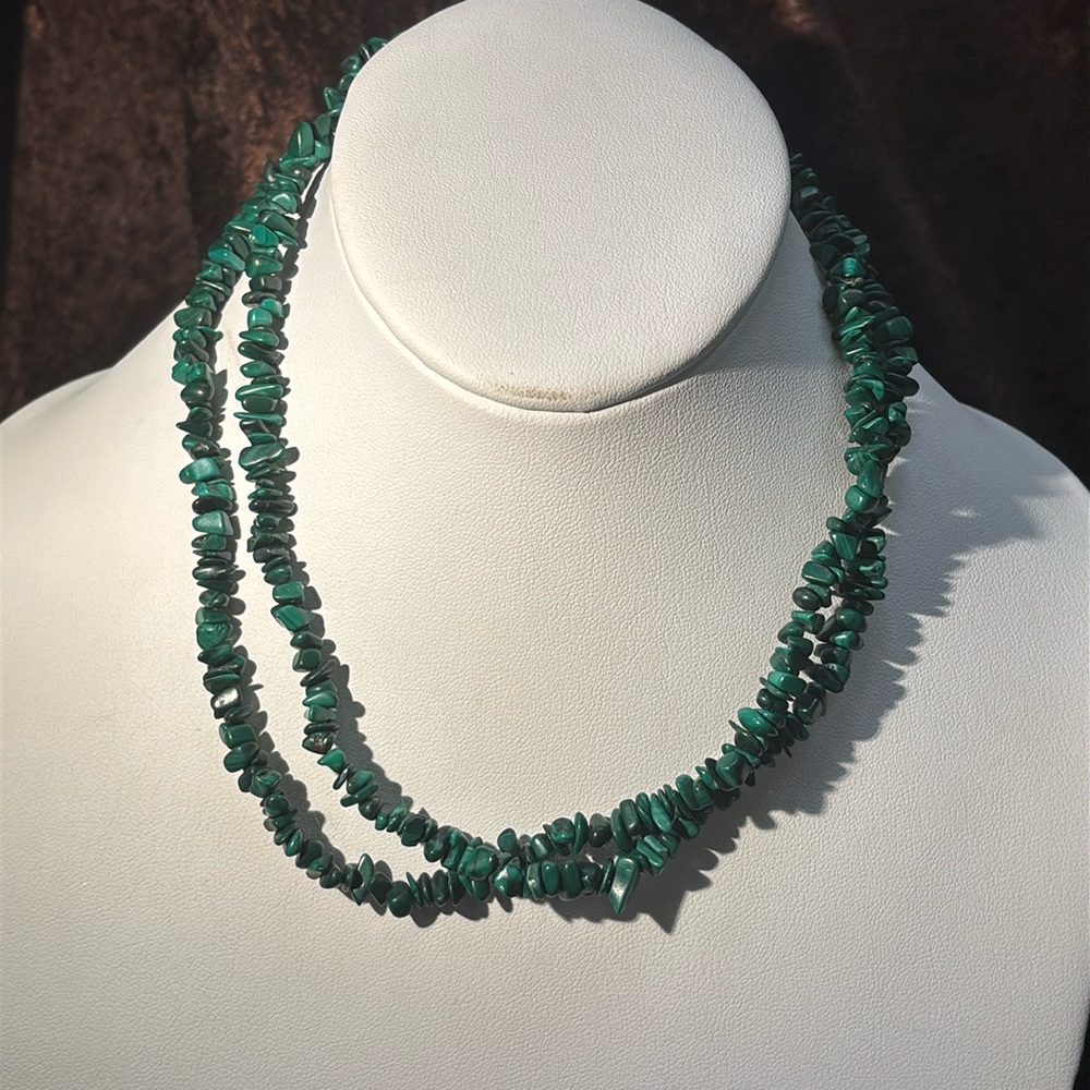 Continuous strand of Malacate beads. 34 inches. Natural stones